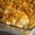 Closeup of Latter-day Saints Potato Casserole Recipe with golden cornflake topping
