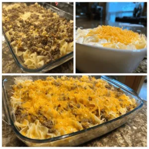 Layered Poor Man Husband Casserole with ground beef, noodles, and cheese in a glass baking dish